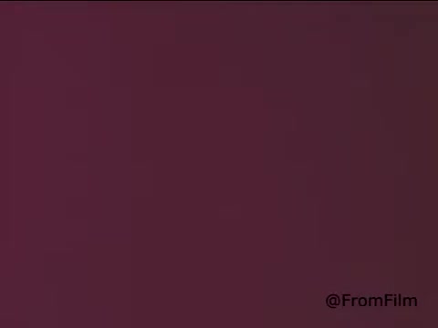 The still from the Murine Eye Drops commercial features a simple, monochromatic background, likely indicative of the aesthetic used in advertising during the 1960s or 1970s. The minimalistic design is characteristic of that era's promotional materials, focusing on the product's branding and messaging. Overall, it captures the essence of vintage advertising, emphasizing clarity and straightforward presentation.