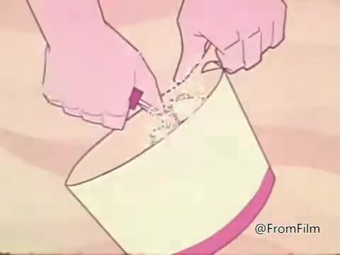 The still from the 'Salmonella PSA - American Medical Association 1960s' shows a pair of hands mixing what appears to be a powder into a bowl. The animation style is simplistic and colorful, typical of educational films from that era. This scene likely underscores the importance of proper food preparation to avoid salmonella contamination, emphasizing hygiene practices when handling food items, especially raw or undercooked ingredients like meat and eggs.