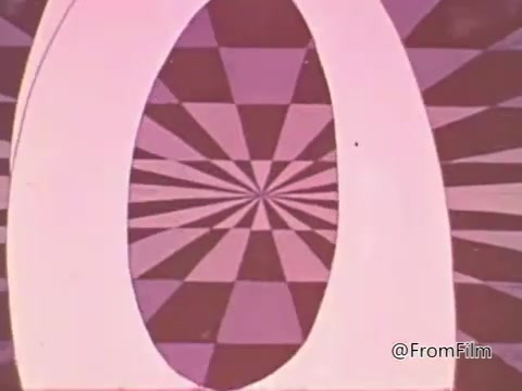 The still from the 'Salmonella PSA - American Medical Association 1960's' features a vibrant, eye-catching design with a prominent oval shape at the center, surrounded by a radiating pattern of geometric shapes. The colors are likely a mix of pinks and purples, typical of mid-20th century animation styles. This visual suggests a dynamic approach to capturing viewers' attention, likely serving to convey an educational message about salmonella and food safety. The overall aesthetic reflects the era's graphic design trends, aiming to inform the public about the risks associated with raw or undercooked foods.