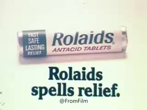 The still features a roll of Rolaids antacid tablets prominently displayed. Below it, the text 'Rolaids spells relief.' is clearly visible. The commercial is iconic, leveraging the famous tag line from the 1970s that played on the notion of immediate relief from heartburn and indigestion. The imagery and wording emphasize the product's effectiveness, aligning with its association as a sponsor of the Rolaids Relief Man of the Year Award in Major League Baseball.