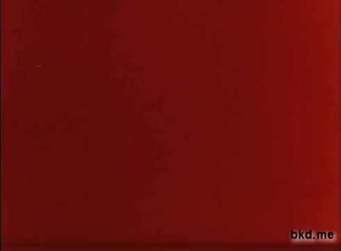 The still from 'Adventure: The Incredible Auto Race' (1970) features a predominantly red background, likely indicating a stylistic choice or theme. The simplicity of the image suggests an emphasis on branding or title presentation, typical of promotional materials. This kind of visual could serve to attract attention and evoke excitement about the road rally from London to Sydney.