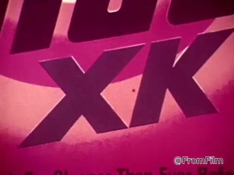 The still features the logo 'Tide XK' prominently displayed against a vivid pink background. The focus is on the brand's innovative qualities, highlighting its effectiveness in tackling tough stains like blood and ketchup. The tagline emphasizes a breakthrough in cleaning technology, positioning Tide XK as a superior detergent. The commercial aims to convey confidence and reassurance to consumers regarding stain removal.