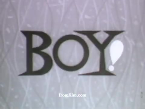 The still from the UPA commercials features the word 'BOY!' prominently displayed. The typography is bold and playful, reflecting the style of mid-century animation. The design is likely accompanied by a colorful or textured background, characteristic of UPA's distinctive visual approach. Given the context, this commercial for American Express likely aims to evoke a sense of excitement or enthusiasm, aligning with the fun and whimsical nature of UPA's animation style.