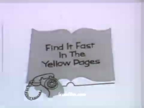 The still features a stylized image of an open book, likely representing a phone directory, with the text 'Find It Fast In The Yellow Pages' prominently displayed. A vintage telephone is illustrated next to the book, emphasizing the connection between the phone directory and reaching out for services. This animation style aligns with UPA's distinctive approach to design, showcasing simplicity and clarity, common in their commercials from the late 1950s, promoting American Express.