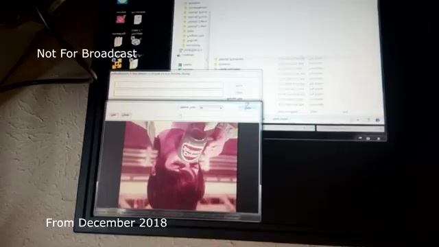 The still from the December 2018 transfer talk shows a computer desktop with a video player open, displaying a portion of a vintage commercial. The image appears to be flipped upside down, perhaps indicating a transfer issue or editing challenge. The labels 'Not For Broadcast' and 'From December 2018' are overlayed, emphasizing its archival nature. This context highlights the technical considerations involved in transferring a TV commercial from film to video, particularly the audio sync issues you've resolved.