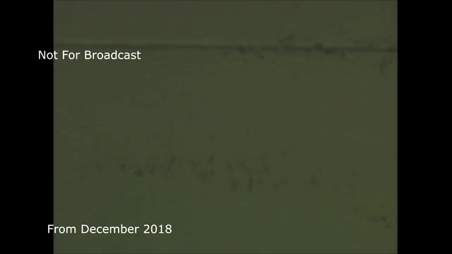 The still from the December 2018 transfer talk features a faded, textured background likely representing a film frame. Overlayed text indicates that it is 'Not For Broadcast' and notes the date, which highlights it as archival material. In this content, you discuss the technical process of transferring a TV commercial from film to video, mentioning previous audio sync issues you've resolved. It appears to serve as a behind-the-scenes insight into the challenges of media transfer and preservation.