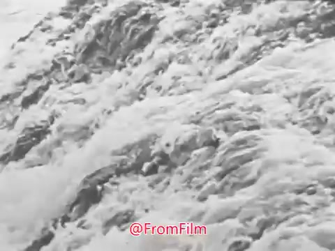 The still from the 'US Navy Recruiting PSA - 1960's' features tumultuous waves crashing against the shore, evoking a sense of the relentless and timeless nature of the sea. The accompanying voice-over reflects on the sea's enduring presence through 'endless nights and endless days,' highlighting a theme of continuity and the call to service.