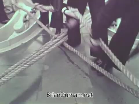 The still from the 1968 US Navy PSA depicts sailors on a ship working with ropes. The focus is on their feet and the thick ropes on the deck, illustrating tasks related to seamanship. The environment suggests a maritime setting, emphasizing teamwork and nautical operations.