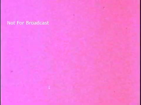 The still features a solid pink background with the text 'Not For Broadcast' appearing in the upper left corner. The simplicity of the image suggests a focus on mental health awareness, typical of public service announcements from the 1970s. The vibrant color may convey an emotional or psychological theme.