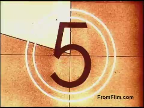 The still features a large, bold number '5' at the center, indicating a countdown. Surrounding it are concentric circles, a typical design used in film countdowns. The background has a textured, faded appearance characteristic of 1970s film stock, with warm, earthy tones. The overall composition suggests the anticipation of a film's start, reflective of the era's cinematic style.