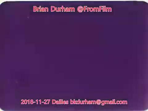 The still features a monochromatic purple background with text overlay indicating it is from Brian Durham's '@FromFilm' series, dated November 27, 2018. The image likely pertains to film dailies related to the project titled 'ffn035-dristan-dailies.' The overall composition is simple and focused on the text rather than visual imagery.