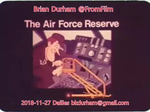 The still features an animated character, likely a pilot, seated in a cockpit with various controls visible. The title 'The Air Force Reserve' is prominently displayed, suggesting it relates to that organization's promotional or informational material. The style appears retro, indicative of mid-20th-century animation.