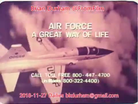The still features a military jet in flight against a cloudy backdrop, accompanied by promotional text that reads 'AIR FORCE A GREAT WAY OF LIFE.' Contact information with a toll-free number is also displayed, alongside the date '2018-11-27' and an email address for inquiries. The overall tone suggests a recruitment or informational message about the Air Force.