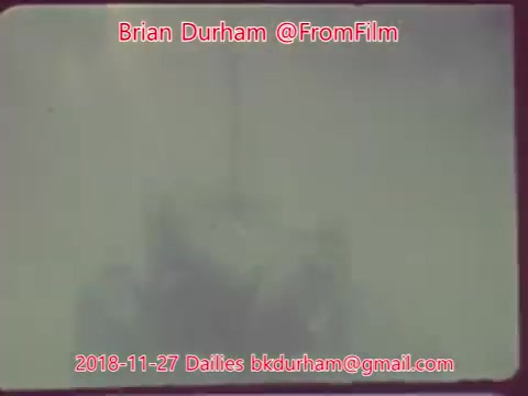 The 16mm still appears to be from a film daily dated November 27, 2018, under the title 'ffn035-dristan-dailies.' The image is quite unclear or blurry, making it difficult to discern specific details about the scene depicted. The overall tone seems muted, possibly suggesting a vintage or faded aesthetic typical of older film stock. Context and subject matter are ambiguous without additional visual clarity.