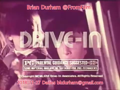 The still features a vintage film graphic with the title 'DRIVE-IN' prominently displayed. It includes a 'PG' rating, indicating parental guidance is suggested due to potentially inappropriate material for pre-teens. The overall aesthetic reflects a nostalgic vibe typical of older films, likely taken from the 16mm format. The image is attributed to Brian Durham and dated November 27, 2018.