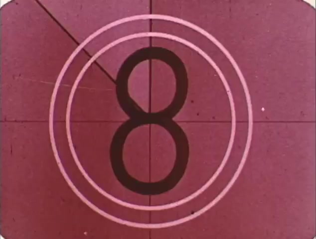 The still features a classic film countdown with the number '8' displayed prominently in a circular design. The colors have a vintage tone, typical of 16mm film, with a warm, reddish background. This particular frame likely serves as an introduction to the trailer for the double feature of 'Dirty Mary, Crazy Larry' and 'Vanishing Point.' The countdown suggests that this is an old-school cinematic format, emphasizing nostalgia and the era of reissue trailers.