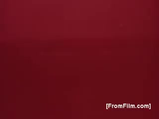 The still features a rich, deep red background, typical of vintage advertising aesthetics from the 1970s. There are no prominent images or text visible, suggesting a minimalist design that likely emphasizes the product’s elegance and sophistication. This approach aligns with the branding of Seagram's 100 Pipers Scotch, conveying a sense of tradition and quality.