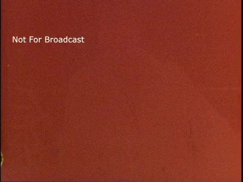 The still shows a red background with the text 'Not For Broadcast' prominently displayed. It likely serves as a title card or disclaimer for a public service announcement featuring Muhammad Ali focused on raising awareness about multiple sclerosis. The overall tone suggests a serious and informative message.