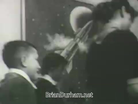 The still features two boys and a woman amidst a backdrop depicting a space theme, possibly suggesting a focus on educational or imaginative programming. The setting appears informal, indicating a promotional context aimed at engaging young viewers for the ABC Fall 1963 season.