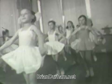 The still features a group of young girls in ballet attire. They are performing in what appears to be a dance studio, with an emphasis on graceful movements. The image captures a nostalgic and playful atmosphere typical of children's activities, reflecting a moment from the ABC promotional material for their Fall 1963 season. The lighting is soft and the scene conveys a sense of innocence and joy.