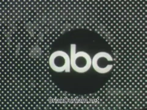 The still features the classic ABC logo set against a textured background of dots. The logo is presented in a bold, minimalist style, symbolizing the network's identity. The overall aesthetic reflects the early 1960s design sensibilities, capturing a sense of nostalgia for television promotions of that era. The image conveys a sense of branding and promotional intent for the fall 1963 season.