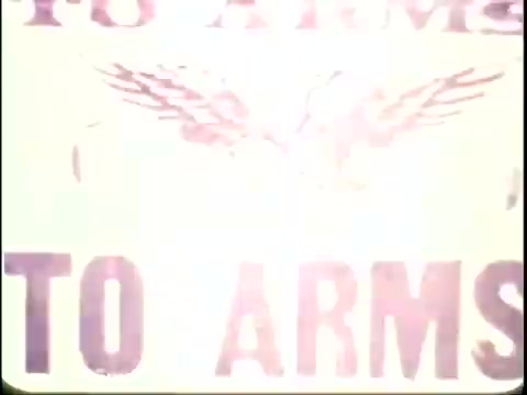 The still from the 'Bicentennial Youth Debates - PSA from 1975' features a prominent sign that reads 'TO ARMS.' Accompanied by imagery of wings, it suggests themes of patriotism and potential conflict. This visual connects to the broader context of the Bicentennial Youth Debates, a national initiative encouraging young people to engage in discussions about various important issues impacting society. The program aimed to promote critical thinking and civic engagement among youth during a significant period in American history.