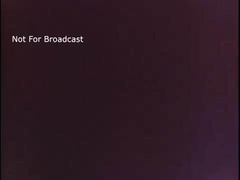 The still appears to showcase a scene from a 16mm public service announcement for the US Coast Guard from the 1970s. It likely includes a message related to maritime safety or awareness. The text 'Not For Broadcast' indicates that this material was intended for internal use or specific audiences rather than general airing. The overall tone is likely informative and promotional, aiming to raise awareness about the Coast Guard and its roles.