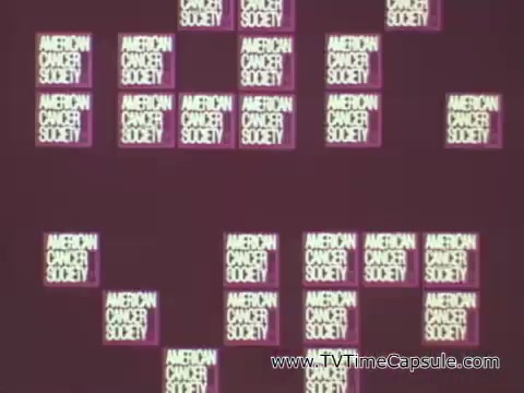 The still from the 'American Cancer Society PSA with Walter Schirra' features a graphic design displaying the text 'AMERICAN CANCER SOCIETY' repeated in a grid pattern. The background is likely a solid color, contributing to a clean and organized aesthetic. This design choice emphasizes the importance of the message being conveyed. Walter Schirra's voiceover underscores the significance of regular checkups and being vigilant about health, paralleling the thoroughness of an astronaut’s preparation before a mission. The overall tone is serious and educational, aimed at increasing awareness about cancer prevention and health checkups.