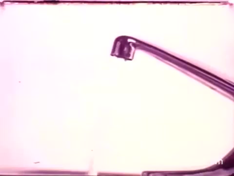 The still from the 'DuPont Lucite Wall Paint commercial' likely depicts a vintage aesthetic typical of the 1970s. It features a close-up of a paint can with a spout that appears poised to dispense paint. The background is likely a plain, soft color, enhancing the focus on the paint application process. This visual may convey the simplicity and efficiency of using DuPont's Lucite Wall Paint, emphasizing its affordability at $7.97 per can. The overall composition may evoke a nostalgic feeling, typical of advertisements from that era.   For more content, subscribe, like, or follow @FromFilm on Twitter.