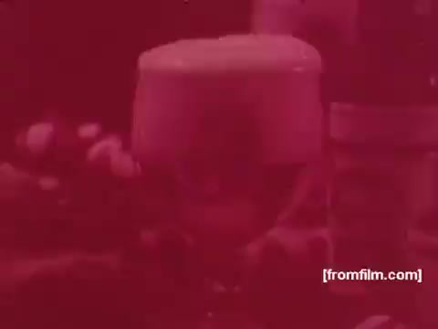 The still from the Pabst Beer commercials features a close-up of a frothy glass of beer, highlighting the rich, creamy head atop the drink. The background is softly blurred, suggesting an inviting atmosphere, possibly accompanied by casual dining or socializing. The color palette has a warm, vintage feel typical of 1970s advertising, emphasizing the enjoyable experience of drinking Pabst Beer.