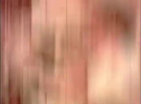 The still from 'The Human Cell and the Cytologist' appears to be a blurred or distorted image, likely due to the characteristics of the 16mm print. It may depict cell structures or cytological details, consistent with the film's educational focus on cellular biology. The overall aesthetic reflects the film medium's age, showcasing the historical context of educational cinema.