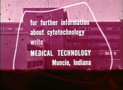 The still features a text overlay promoting educational resources about cytotechnology. The message provides contact information for 'Medical Technology' in Muncie, Indiana. The background suggests a building, likely related to medical education, with a vintage aesthetic typical of 16mm film. The overall appearance includes some film grain and color fading, reflecting its age.