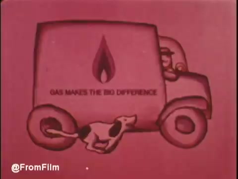 The still features a stylized animated truck with a flame symbol and the text 'GAS MAKES THE BIG DIFFERENCE.' A playful dog runs alongside the vehicle, set against a vibrant pink background. This visual is part of a vintage commercial promoting gas air conditioning by Bryant.