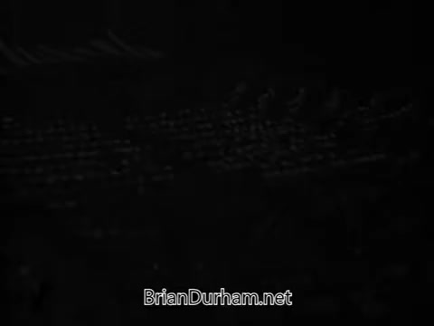 The still from the 'National Education Association PSA' appears to be a low-light or high-contrast image with an abstract arrangement of shapes or patterns. The details are not clear, suggesting a focus on mood or atmosphere rather than specific subjects. The overall tone conveys a sense of seriousness and importance, likely related to educational themes.