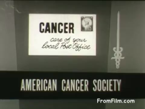 The still from the PSA 'Cobalt Bomb' features a simple, mid-20th-century design. It reads 'CANCER care of your local Post Office,' indicating a method for obtaining information or assistance regarding cancer treatment. The bottom section prominently displays 'AMERICAN CANCER SOCIETY,' emphasizing the organization's role in cancer awareness and support. The image reflects the public health messaging style of the 1950s, utilizing straightforward graphics to convey important health information.