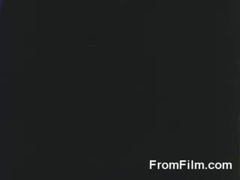 The still shows a scene from the Doolittle Raid, capturing the moment of B-25 bombers being launched from the USS Hornet on April 18, 1942. The image likely conveys a sense of urgency and military action during this pivotal moment in World War II. The focus is on the aircraft and the naval setting, emphasizing the historic significance of the raid.