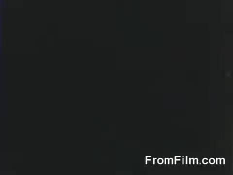 The still captures a moment from the Doolittle Raid, depicting B-25 bombers preparing for takeoff from the USS Hornet on April 18, 1942. The footage emphasizes the historical significance of this daring mission conducted during World War II, showcasing the aircraft poised for their critical launch. The atmosphere reflects the tension and determination of the raiders as they embark on their strategic operation against Japan.