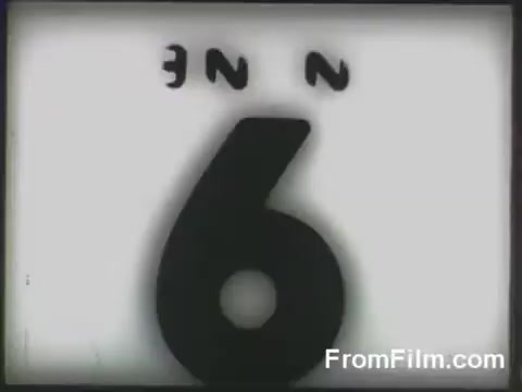 The still depicts a countdown number '6' in a stylized font against a simple background. This clip likely signifies the moment just before the launch of B-25 bombers during the Doolittle Raid from the USS Hornet on April 18, 1942, capturing the tension and anticipation of the historic event.