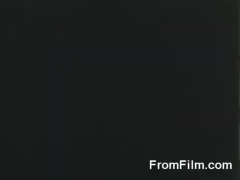 The still likely captures a moment from the Doolittle Raid, showcasing the B-25 bombers being prepared for launch from the USS Hornet on April 18, 1942. The focus is on the aircraft and the operational activity on the aircraft carrier, illustrating the historical significance of this daring mission during World War II.