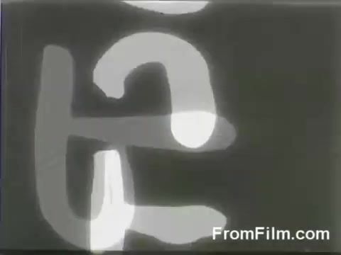 The still captures a vintage black-and-white film frame, likely featuring abstract shapes or markings. The context is the historic Doolittle Raid on April 18, 1942, where B-25 bombers were launched from the USS Hornet, marking a significant moment in World War II. The image evokes a sense of urgency and historical significance, capturing the essence of this daring military operation.