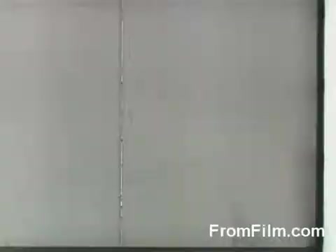 The still depicts a historical moment from the Doolittle Raid, showcasing the launch of B-25 bombers from the USS Hornet on April 18, 1942. The image captures the tension and anticipation as the raiders prepare to take off on their daring mission against Japan during World War II. The frame likely illustrates the aircraft in a military setting, emphasizing the significance of this groundbreaking air raid.