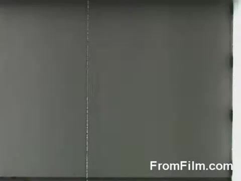 The still captures a moment from the Doolittle Raid, showing B-25 bombers preparing for launch from the USS Hornet on April 18, 1942. The image likely conveys the intensity and urgency of the moment, highlighting the aircraft's alignment on the deck and the naval environment. The date marks a significant event in military history as the first air raid on Japan during World War II.