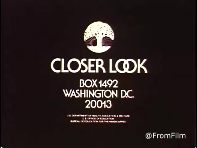 The still features the title 'CLOSER LOOK' prominently displayed, accompanied by a stylized graphic of a tree. Below, it provides a P.O. Box address in Washington, D.C. The bottom text notes affiliations with the U.S. Department of Health, Education, and Welfare, emphasizing a focus on education for handicapped children. The overall design reflects the aesthetics of the 1970s, combining simplicity with a clear message of support.