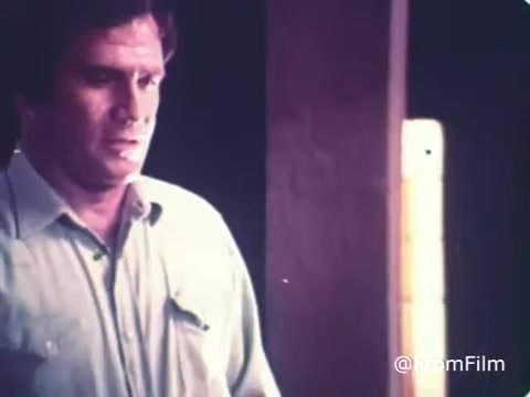 The 16mm still from the 'Roman Meal Bread Commercial' from the 1970s features a man with a concerned expression, likely engaging in a moment of contemplation or realization. This reflects the advertising style of the time, which often emphasized personal moments or testimonials to convey the benefits of the product. Roman Meal, known for its whole-grain offerings, aimed to promote health and wellness through its bread and other products in this campaign.