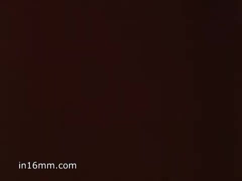 The still from the 'Bubble Up Soda commercial' features a vintage aesthetic typical of the 1970s, capturing the nostalgic vibe of that era. The advertisement promotes Bubble-Up, emphasizing its tart and tangy lemon-lime flavor as a refreshing alternative to other sodas, specifically 7-UP. Accompanied by a catchy jingle, the messaging highlights the drink's thirst-quenching qualities, appealing to fans of lemon-lime sodas. The overall tone is playful and inviting, encouraging consumers to choose Bubble-Up for a bubbly experience.