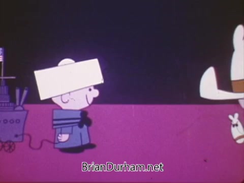 The still features a cartoon-style sailor character in a Navy uniform, interacting with a larger character who has a distinctive white hat and a bag. The background is a simple, vibrant pink, and there's a small animated ship to the left, emphasizing the nautical theme. The characters appear playful and engaging, typical of a recruitment animation aimed at a younger audience.