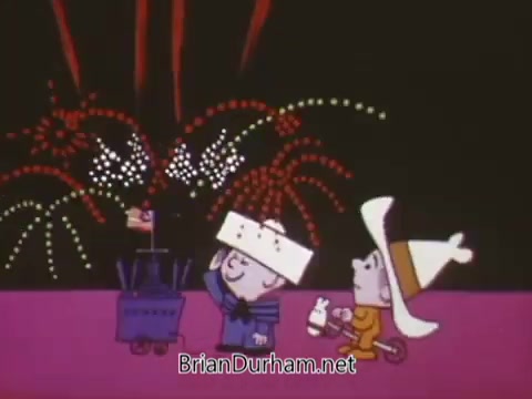 The still from the 1967 US Navy animated recruiting PSA features two animated characters celebrating with fireworks in the background. One character, dressed in a sailor outfit, operates a toy cannon, while the other, wearing a large white hat, appears excited. The scene conveys a festive atmosphere, emphasizing themes of patriotism and celebration.