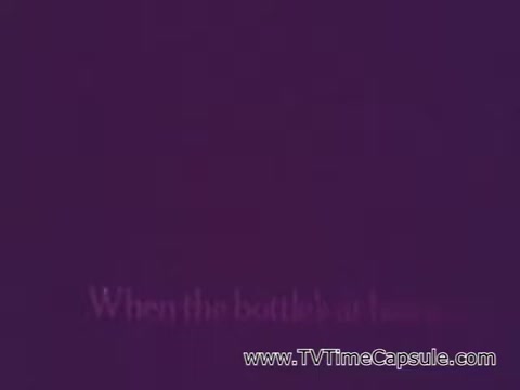 The still from the Listerine Breath Spray commercial features a simple purple background with text stating, 'When the bottle's at hand.' The image emphasizes product availability and convenience, typical of advertising strategies aimed at promoting quick solutions for fresh breath. The overall design is minimalistic, focusing on the message rather than elaborate visuals.