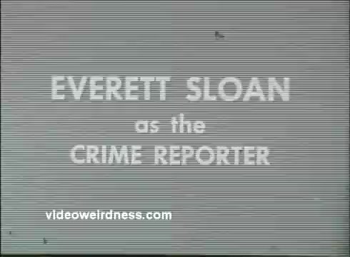 The still features the text 'EVERETT SLOAN as the CRIME REPORTER' displayed in a simple, bold font on a gray background. The image appears to have a vintage quality, typical of 16mm film, possibly indicating a mid-20th century television program. It suggests that Everett Sloan is portraying a character who investigates or reports on crime-related stories. The overall presentation reflects a classic TV title card style.