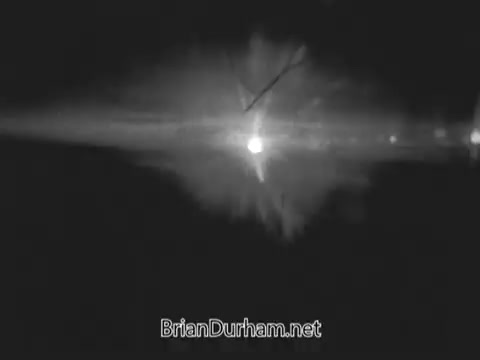 This 16mm still from the 'Jerry Lewis Muscular Dystrophy PSA' captures the essence of Arnold Hughes laboring under the sun, emphasizing his physical strength and dedication. His powerful muscles reflect his determination as he works hard to support his son, Spunky, who struggles with muscular dystrophy. The image conveys a sense of pride intertwined with the emotional weight of a father’s concern for his child’s limitations.